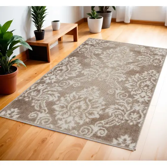 Ivory and Brown Damask Distressed Non Skid Area Rug Photo 1