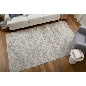 Photo of Ivory and Brown Geometric Power Loom Area Rug