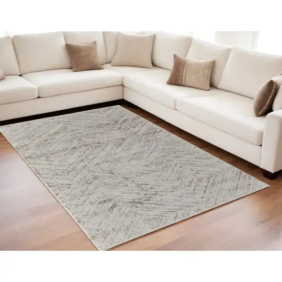 Ivory and Brown Geometric Power Loom Area Rug Photo 1