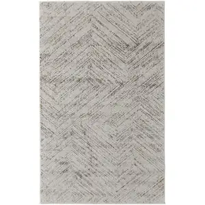 Photo of Ivory and Brown Geometric Power Loom Area Rug