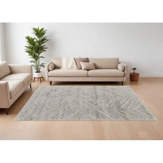 Ivory and Brown Geometric Power Loom Area Rug Photo 1