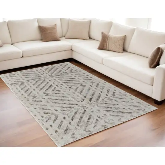 Ivory and Brown Geometric Power Loom Area Rug Photo 1