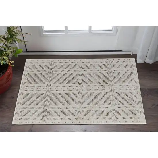 Ivory and Brown Geometric Power Loom Area Rug Photo 1