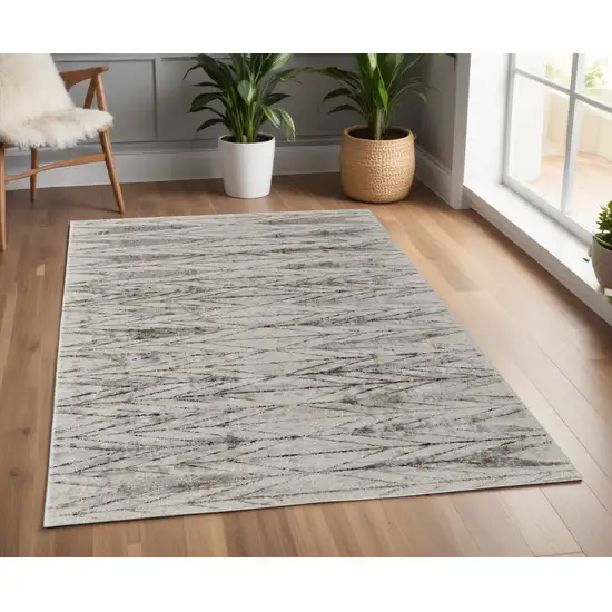 Ivory and Brown Geometric Power Loom Area Rug Photo 1