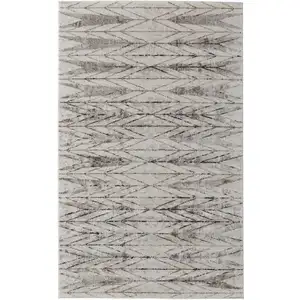 Photo of Ivory and Brown Geometric Power Loom Area Rug