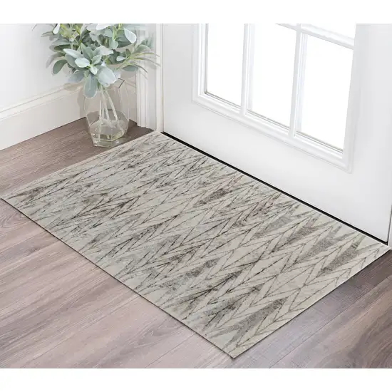 Ivory and Brown Geometric Power Loom Area Rug Photo 1