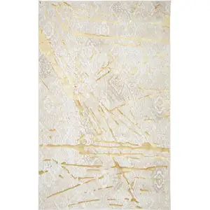 Photo of Ivory and Gold Abstract Area Rug