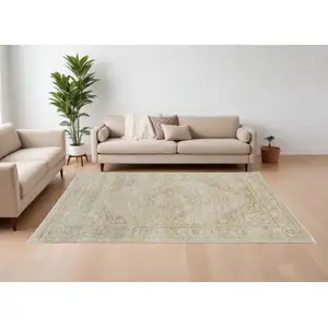 Photo of Ivory and Gold Oriental Power Loom Area Rug