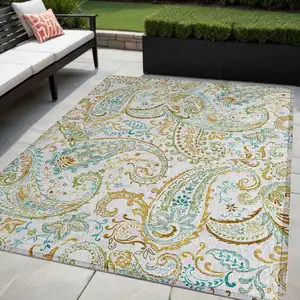 Photo of Ivory and Gold Paisley Washable Non Skid Indoor Outdoor Area Rug