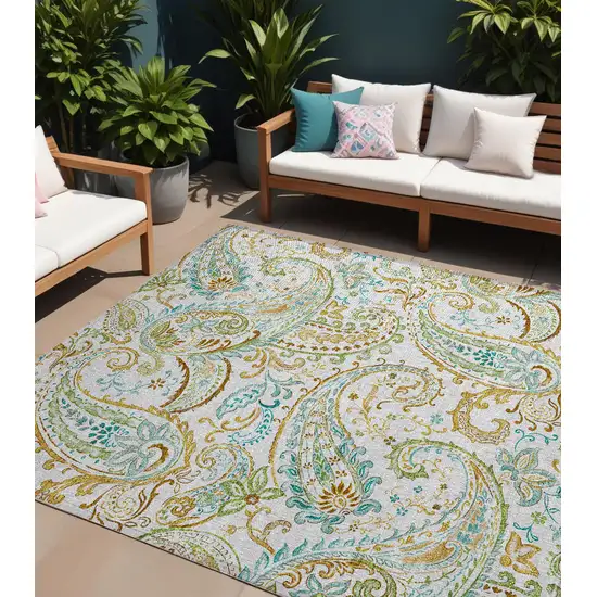 Ivory and Gold Paisley Washable Non Skid Indoor Outdoor Area Rug Photo 1