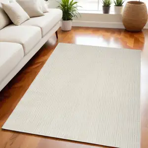 Photo of Ivory and Gray Abstract Area Rug