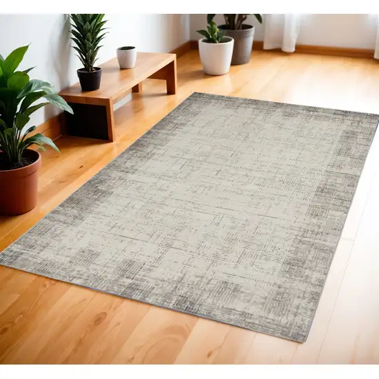 Ivory and Gray Abstract Area Rug Photo 1