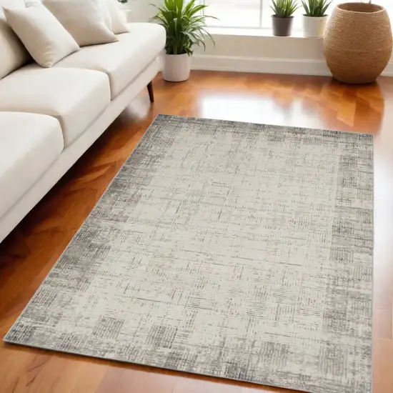 Ivory and Gray Abstract Area Rug Photo 1