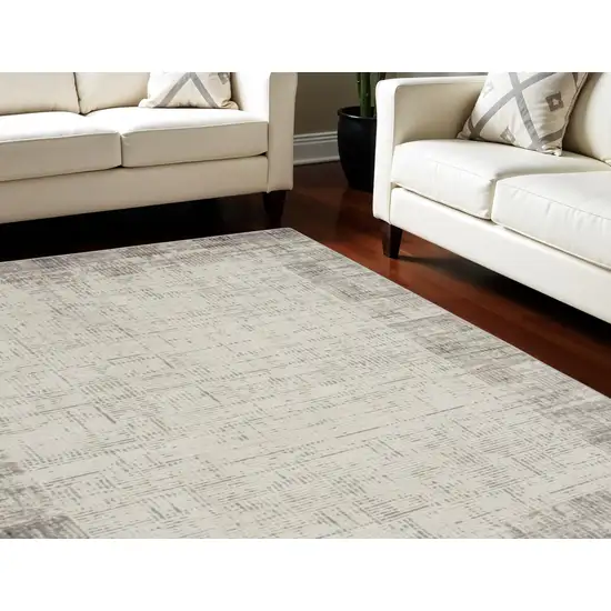 Ivory and Gray Abstract Area Rug Photo 1