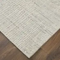 Photo of Ivory and Gray Abstract Hand Woven Worn Faded Area Rug