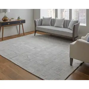 Photo of Ivory and Gray Abstract Hand Woven Worn Faded Area Rug