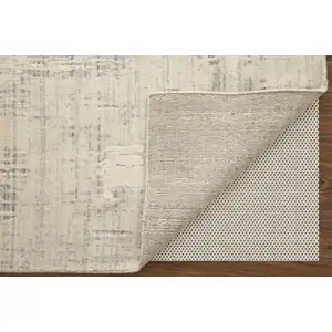 Photo of Ivory and Gray Abstract Hand Woven Worn Faded Area Rug