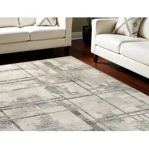 Photo of Ivory and Gray Abstract Non Skid Area Rug