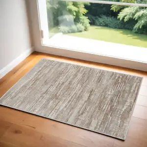 Photo of Ivory and Gray Abstract Non Skid Area Rug