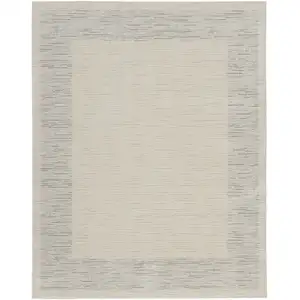 Photo of Ivory and Gray Abstract Power Loom Area Rug