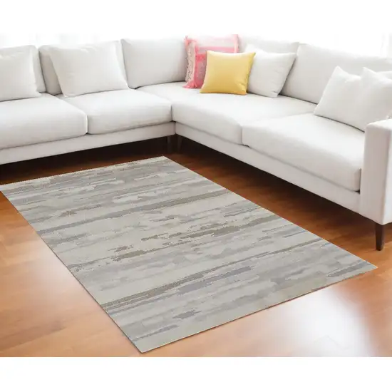 Ivory and Gray Abstract Power Loom Distressed Area Rug Photo 1