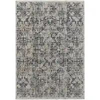 Photo of Ivory and Gray Abstract Power Loom Worn Faded Area Rug With Fringe