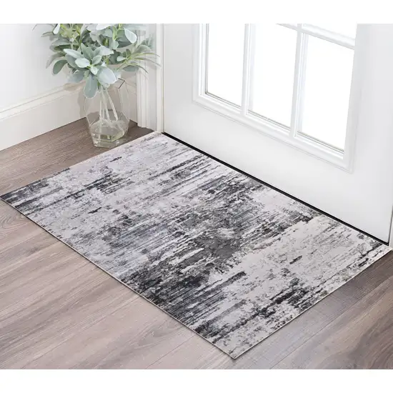 Ivory and Gray Abstract Power Loom Worn Faded Area Rug Photo 1