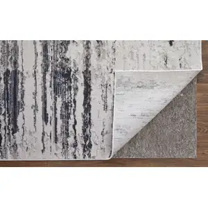 Photo of Ivory and Gray Abstract Power Loom Worn Faded Area Rug