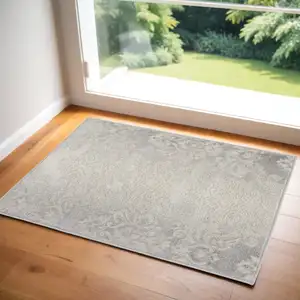 Photo of Ivory and Gray Damask Distressed Non Skid Area Rug