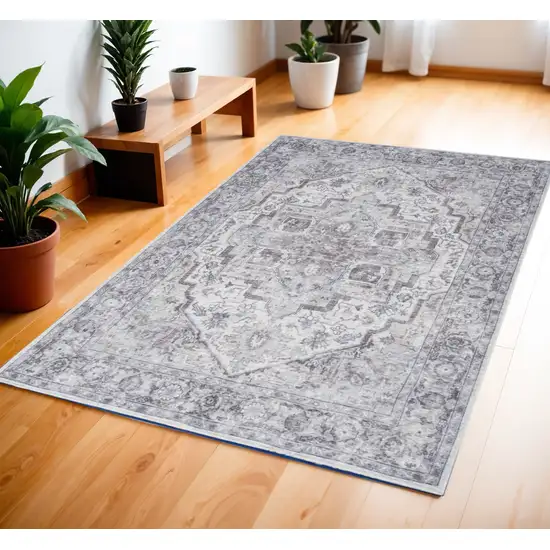 Ivory and Gray Floral Medallion Power Loom Distressed Area Rug Photo 1