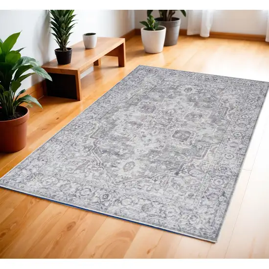 Ivory and Gray Floral Medallion Power Loom Distressed Area Rug Photo 1