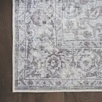 Photo of Ivory and Gray Floral Medallion Power Loom Distressed Area Rug