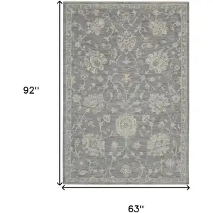 Photo of Ivory and Gray Floral Power Loom Area Rug