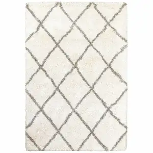 Photo of Ivory and Gray Geometric Lattice Area Rug