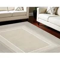 Photo of Ivory and Gray Geometric Non Skid Area Rug