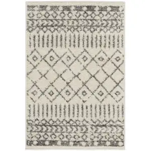 Photo of Ivory and Gray Geometric Scatter Rug