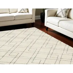 Photo of Ivory and Gray Geometric Shag Area Rug