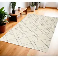 Photo of Ivory and Gray Geometric Shag Area Rug