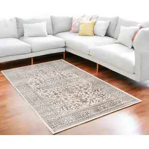 Photo of Ivory and Gray Oriental Area Rug