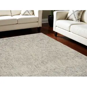 Photo of Ivory and Gray Wool Geometric Area Rug