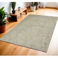 Photo of Ivory and Gray Wool Geometric Area Rug