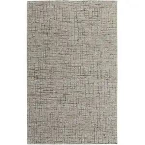 Photo of Ivory and Gray Wool Hand Tufted Distressed Area Rug