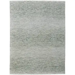 Photo of Ivory and Green Wool Hand Knotted Area Rug With Fringe