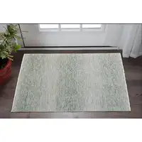 Photo of Ivory and Green Wool Hand Knotted Area Rug With Fringe