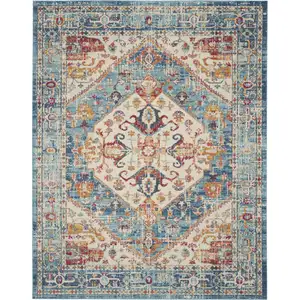 Photo of Ivory and Light Blue Distressed Area Rug