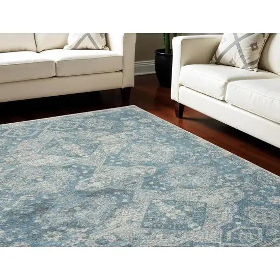 Ivory and Light Blue Geometric Distressed Area Rug Photo 1