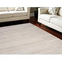 Photo of Ivory and Light Brown Abstract Washable Area Rug