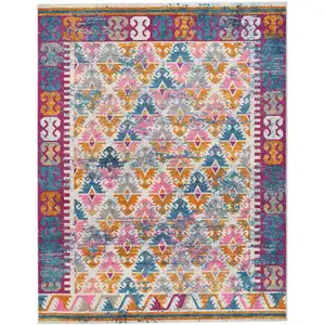 Photo of Ivory and Magenta Tribal Pattern Area Rug