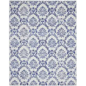 Photo of Ivory and Navy Blue Damask Distressed Non Skid Area Rug