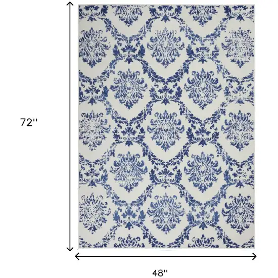 Blue And Ivory Floral Dhurrie Area Rug Photo 5